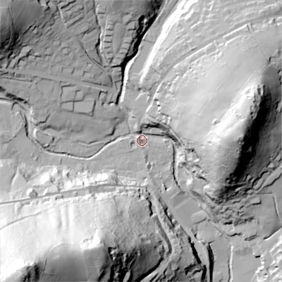 Shaded relief map of the ground around OL35DH, computed from Environment Agency LiDAR. The ground here sits at about 194 m above sea level and falls 126 m across the surrounding 800 m. Surface water reaching this point runs off ground lying to the south-west, 121.2 m higher.