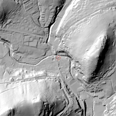 Shaded relief map of the ground around OL35DU, computed from Environment Agency LiDAR. The ground here sits at about 193 m above sea level and falls 126 m across the surrounding 800 m. Surface water reaching this point runs off ground lying to the south-west, 121.3 m higher.
