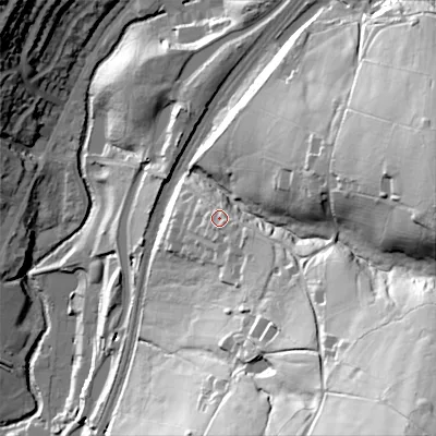 Shaded relief map of the ground around OL35JT, computed from Environment Agency LiDAR. The ground here sits at about 210 m above sea level and falls 105 m across the surrounding 800 m. Surface water reaching this point runs off ground lying to the south-east, 6.5 m higher.