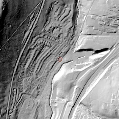 Shaded relief map of the ground around OL35PJ, computed from Environment Agency LiDAR. The ground here sits at about 188 m above sea level and falls 160 m across the surrounding 800 m. Surface water reaching this point runs off ground lying to the north-north-west, 61.0 m higher.