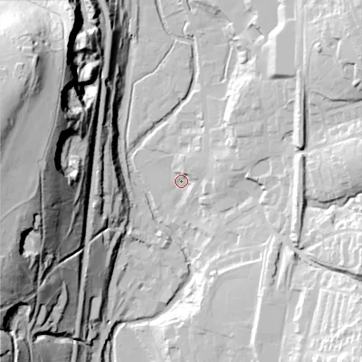Shaded relief map of the ground around OL36AT, computed from Environment Agency LiDAR. The ground here sits at about 161 m above sea level and falls 88 m across the surrounding 800 m. Surface water reaching this point runs off ground lying to the east-north-east, 9.0 m higher.