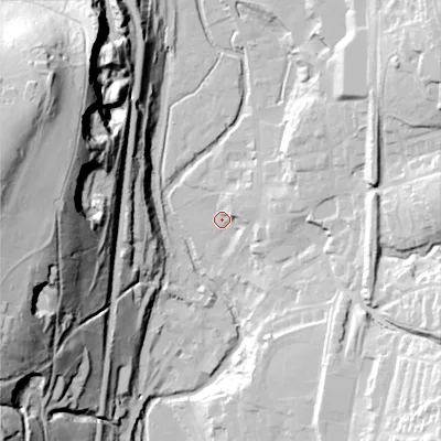 Shaded relief map of the ground around OL36AZ, computed from Environment Agency LiDAR. The ground here sits at about 161 m above sea level and falls 89 m across the surrounding 800 m. Surface water reaching this point runs off ground lying to the east-north-east, 9.0 m higher.