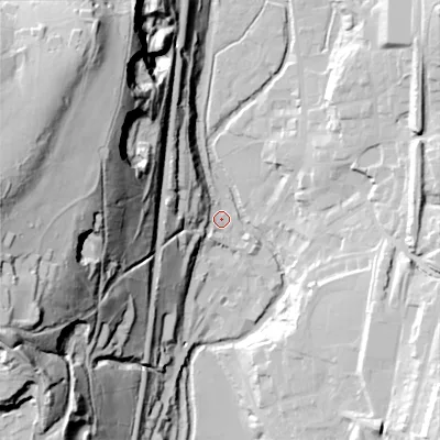 Shaded relief map of the ground around OL36DG, computed from Environment Agency LiDAR. The ground here sits at about 161 m above sea level and falls 97 m across the surrounding 800 m. Surface water reaching this point runs off ground lying to the west, 92.8 m higher.