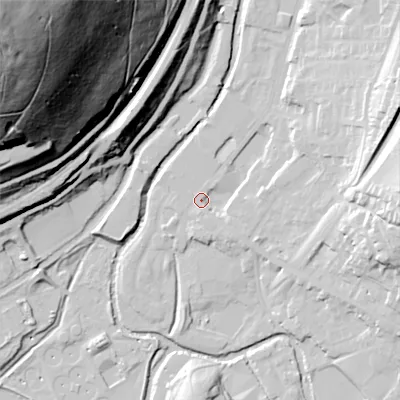 Shaded relief map of the ground around OL37BT, computed from Environment Agency LiDAR. The ground here sits at about 157 m above sea level and falls 159 m across the surrounding 800 m. Surface water reaching this point runs off ground lying to the east, 27.2 m higher.