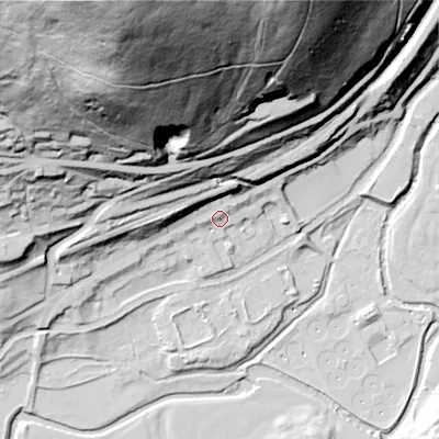 Shaded relief map of the ground around OL37LD, computed from Environment Agency LiDAR. The ground here sits at about 160 m above sea level and falls 180 m across the surrounding 800 m. Surface water reaching this point runs off ground lying to the north-north-west, 164.6 m higher.