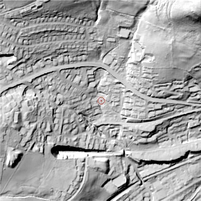 Shaded relief map of the ground around OL44ER, computed from Environment Agency LiDAR. The ground here sits at about 205 m above sea level and falls 171 m across the surrounding 800 m. Surface water reaching this point runs off ground lying to the north-west, 89.7 m higher.