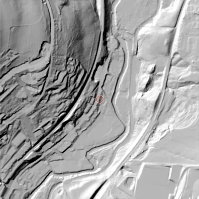 Shaded relief map of the ground around OL59AY, computed from Environment Agency LiDAR. The ground here sits at about 144 m above sea level and falls 113 m across the surrounding 800 m. Surface water reaching this point runs off ground lying to the west, 6.2 m higher.