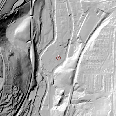 Shaded relief map of the ground around OL59BB, computed from Environment Agency LiDAR. The ground here sits at about 143 m above sea level and falls 86 m across the surrounding 800 m. Surface water reaching this point runs off ground lying to the north-north-east, 2.5 m higher.