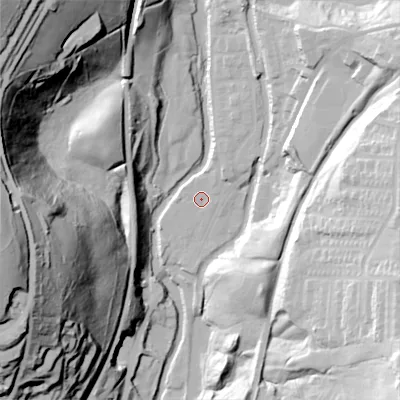 Shaded relief map of the ground around OL59BQ, computed from Environment Agency LiDAR. The ground here sits at about 143 m above sea level and falls 91 m across the surrounding 800 m. Surface water reaching this point runs off ground lying to the north-east, 3.3 m higher.