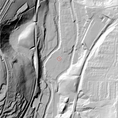 Shaded relief map of the ground around OL59XA, computed from Environment Agency LiDAR. The ground here sits at about 143 m above sea level and falls 90 m across the surrounding 800 m. Surface water reaching this point runs off ground lying to the north-north-east, 3.3 m higher.
