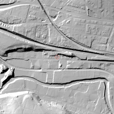 Shaded relief map of the ground around OL66UG, computed from Environment Agency LiDAR. The ground here sits at about 104 m above sea level and falls 32 m across the surrounding 800 m. Surface water reaching this point runs off ground lying to the east-north-east, 12.5 m higher.