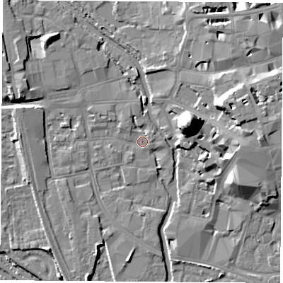 Shaded relief map of the ground around OX11HQ, computed from Environment Agency LiDAR. The ground here sits at about 57 m above sea level and falls 22 m across the surrounding 800 m. Surface water reaching this point runs off ground lying to the north-west, 6.4 m higher.