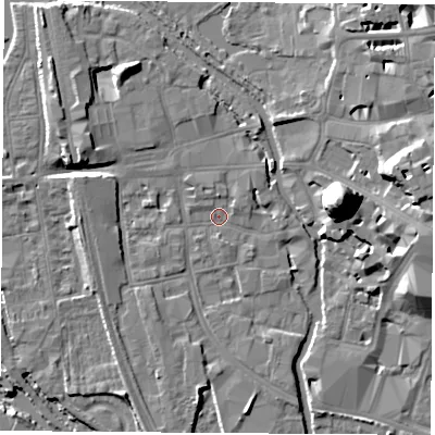 Shaded relief map of the ground around OX11JP, computed from Environment Agency LiDAR. The ground here sits at about 57 m above sea level and falls 22 m across the surrounding 800 m. Surface water reaching this point runs off ground lying to the north-north-west, 6.4 m higher.