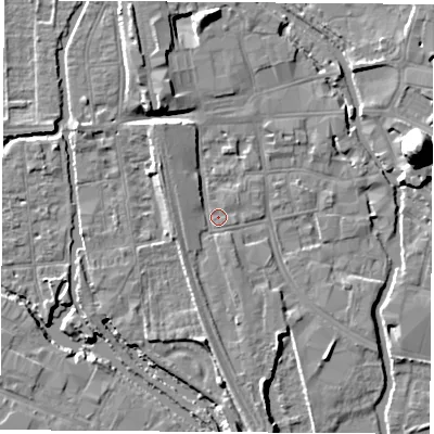 Shaded relief map of the ground around OX11LF, computed from Environment Agency LiDAR. The ground here sits at about 57 m above sea level and falls 22 m across the surrounding 800 m. Surface water reaching this point runs off ground lying to the north-north-west, 2.6 m higher.