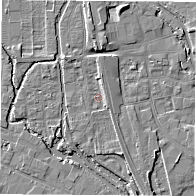 Shaded relief map of the ground around OX11NN, computed from Environment Agency LiDAR. The ground here sits at about 57 m above sea level and falls 7 m across the surrounding 800 m. Surface water reaching this point runs off ground lying to the north, 3.3 m higher.
