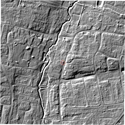 Shaded relief map of the ground around OX127EZ, computed from Environment Agency LiDAR. The ground here sits at about 74 m above sea level and falls 8 m across the surrounding 800 m. Surface water reaching this point runs off ground lying to the east-north-east, 2.3 m higher.