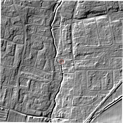 Shaded relief map of the ground around OX127JN, computed from Environment Agency LiDAR. The ground here sits at about 75 m above sea level and falls 8 m across the surrounding 800 m. Surface water reaching this point runs off ground lying to the south-west, 6.1 m higher.
