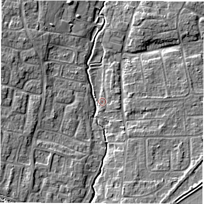 Shaded relief map of the ground around OX127JP, computed from Environment Agency LiDAR. The ground here sits at about 75 m above sea level and falls 8 m across the surrounding 800 m. Surface water reaching this point runs off ground lying to the south-south-east, 1.2 m higher.