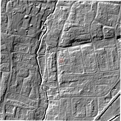 Shaded relief map of the ground around OX127JT, computed from Environment Agency LiDAR. The ground here sits at about 75 m above sea level and falls 7 m across the surrounding 800 m. Surface water reaching this point runs off ground lying to the south, 3.9 m higher.