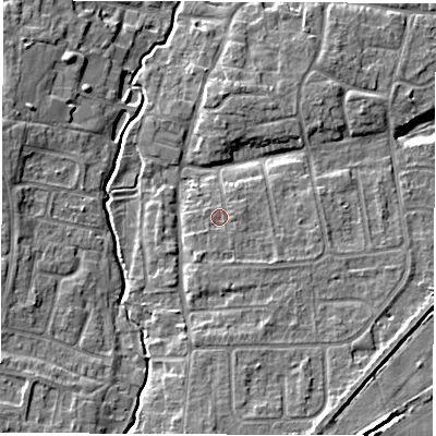 Shaded relief map of the ground around OX127LT, computed from Environment Agency LiDAR. The ground here sits at about 75 m above sea level and falls 7 m across the surrounding 800 m. Surface water reaching this point runs off ground lying to the south-south-east, 1.1 m higher.