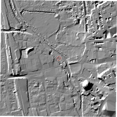 Shaded relief map of the ground around OX12EZ, computed from Environment Agency LiDAR. The ground here sits at about 57 m above sea level and falls 21 m across the surrounding 800 m. Surface water reaching this point runs off ground lying to the north-west, 3.5 m higher.