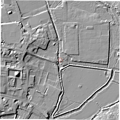 Shaded relief map of the ground around OX13TP, computed from Environment Agency LiDAR. The ground here sits at about 56 m above sea level and falls 14 m across the surrounding 800 m. Surface water reaching this point runs off ground lying to the north-west, 6.8 m higher.