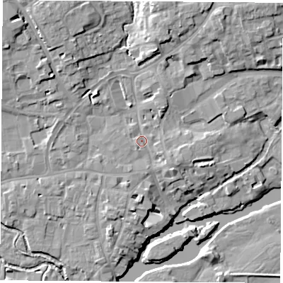 Shaded relief map of the ground around OX143JP, computed from Environment Agency LiDAR. The ground here sits at about 54 m above sea level and falls 13 m across the surrounding 800 m. Surface water reaching this point runs off ground lying to the east-south-east, 2.6 m higher.