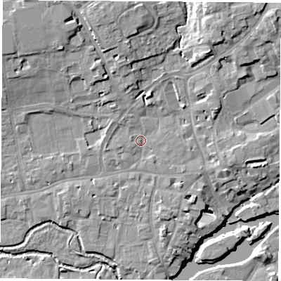 Shaded relief map of the ground around OX143QH, computed from Environment Agency LiDAR. The ground here sits at about 54 m above sea level and falls 13 m across the surrounding 800 m. Surface water reaching this point runs off ground lying to the north-west, 1.8 m higher.