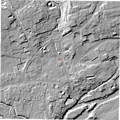 Shaded relief map of the ground around OX143QS, computed from Environment Agency LiDAR. The ground here sits at about 53 m above sea level and falls 13 m across the surrounding 800 m. Surface water reaching this point runs off ground lying to the south-east, 2.6 m higher.