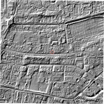 Shaded relief map of the ground around OX145JA, computed from Environment Agency LiDAR. The ground here sits at about 52 m above sea level and falls 4 m across the surrounding 800 m. Surface water reaching this point runs off ground lying to the north-west, 2.5 m higher.