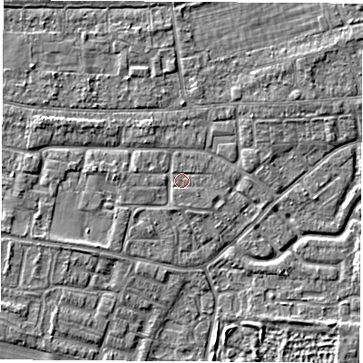 Shaded relief map of the ground around OX145NH, computed from Environment Agency LiDAR. The ground here sits at about 52 m above sea level and falls 3 m across the surrounding 800 m. Surface water reaching this point runs off ground lying to the west-north-west, 1.9 m higher.