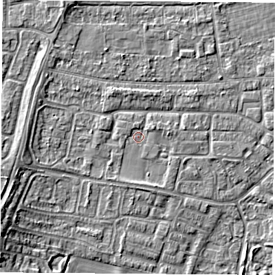 Shaded relief map of the ground around OX145TT, computed from Environment Agency LiDAR. The ground here sits at about 52 m above sea level and falls 7 m across the surrounding 800 m. Surface water reaching this point runs off ground lying to the east-north-east, 1.3 m higher.