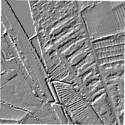 Shaded relief map of the ground around OX14TS, computed from Environment Agency LiDAR. The ground here sits at about 56 m above sea level and falls 3 m across the surrounding 800 m. Surface water reaching this point runs off ground lying to the west-north-west, 2.5 m higher.