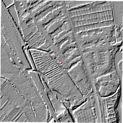 Shaded relief map of the ground around OX14TW, computed from Environment Agency LiDAR. The ground here sits at about 56 m above sea level and falls 6 m across the surrounding 800 m. Surface water reaching this point runs off ground lying to the east-south-east, 2.8 m higher.