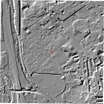 Shaded relief map of the ground around OX26AT, computed from Environment Agency LiDAR. The ground here sits at about 58 m above sea level and falls 8 m across the surrounding 800 m. Surface water reaching this point runs off ground lying to the east-north-east, 7.6 m higher.