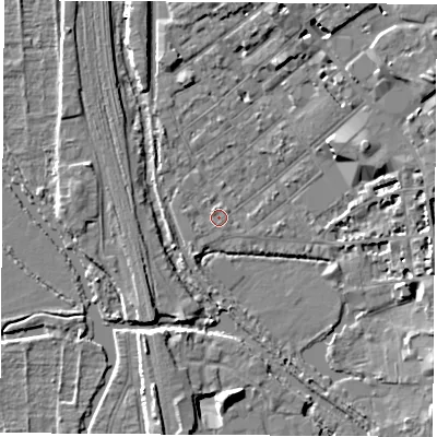 Shaded relief map of the ground around OX26AX, computed from Environment Agency LiDAR. The ground here sits at about 58 m above sea level and falls 9 m across the surrounding 800 m. Surface water reaching this point runs off ground lying to the north-east, 0.9 m higher.