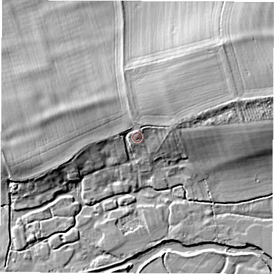 Shaded relief map of the ground around OX297QS, computed from Environment Agency LiDAR. The ground here sits at about 69 m above sea level and falls 10 m across the surrounding 800 m. Surface water reaching this point runs off ground lying to the east-north-east, 2.8 m higher.