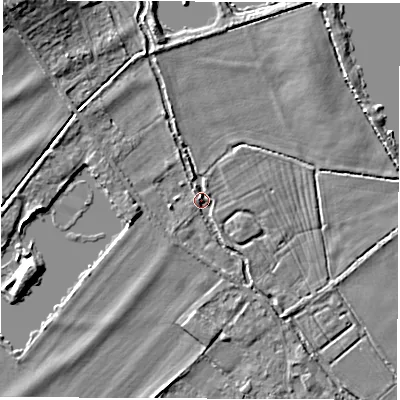 Shaded relief map of the ground around OX297ST, computed from Environment Agency LiDAR. The ground here sits at about 67 m above sea level and falls 8 m across the surrounding 800 m. Surface water reaching this point runs off ground lying to the north-west, 7.6 m higher.
