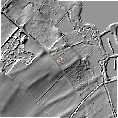 Shaded relief map of the ground around OX297TB, computed from Environment Agency LiDAR. The ground here sits at about 74 m above sea level and falls 13 m across the surrounding 800 m. Surface water reaching this point runs off ground lying to the north-west, 1.1 m higher.