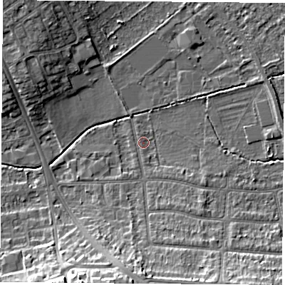 Shaded relief map of the ground around OX43NR, computed from Environment Agency LiDAR. The ground here sits at about 58 m above sea level and falls 15 m across the surrounding 800 m. Surface water reaching this point runs off ground lying to the south, 9.3 m higher.