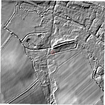 Shaded relief map of the ground around OX447SL, computed from Environment Agency LiDAR. The ground here sits at about 64 m above sea level and falls 13 m across the surrounding 800 m. Surface water reaching this point runs off ground lying to the south-south-east, 6.9 m higher.