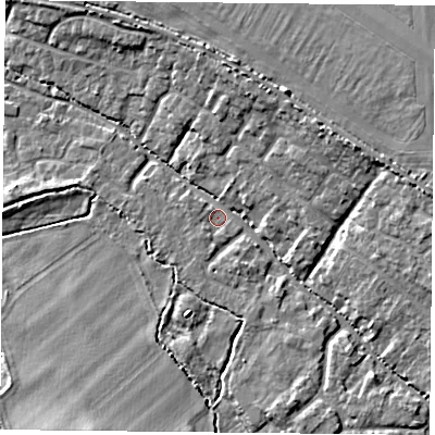Shaded relief map of the ground around OX447SS, computed from Environment Agency LiDAR. The ground here sits at about 65 m above sea level and falls 10 m across the surrounding 800 m. Surface water reaching this point runs off ground lying to the east, 8.6 m higher.