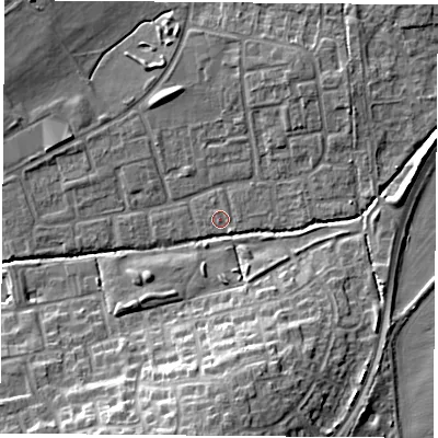 Shaded relief map of the ground around OX46QE, computed from Environment Agency LiDAR. The ground here sits at about 62 m above sea level and falls 13 m across the surrounding 800 m. Surface water reaching this point runs off ground lying to the south-east, 0.9 m higher.