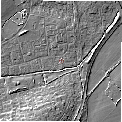 Shaded relief map of the ground around OX46QG, computed from Environment Agency LiDAR. The ground here sits at about 63 m above sea level and falls 11 m across the surrounding 800 m. Surface water reaching this point runs off ground lying to the east, 1.3 m higher.
