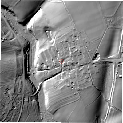 Shaded relief map of the ground around OX74NN, computed from Environment Agency LiDAR. The ground here sits at about 144 m above sea level and falls 41 m across the surrounding 800 m. Surface water reaching this point runs off ground lying to the east-north-east, 10.3 m higher.