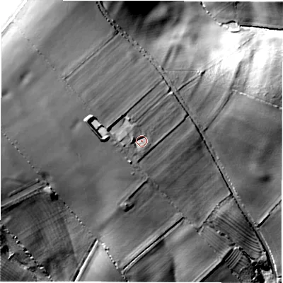 Shaded relief map of the ground around OX76AL, computed from Environment Agency LiDAR. The ground here sits at about 135 m above sea level and falls 65 m across the surrounding 800 m. Surface water reaching this point runs off ground lying to the north-west, 24.5 m higher.