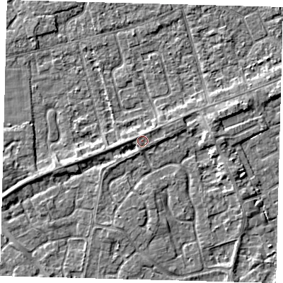 Shaded relief map of the ground around PE111JN, computed from Environment Agency LiDAR. The ground here sits at about 4 m above sea level and falls 3 m across the surrounding 800 m. Surface water reaching this point runs off ground lying to the north-east, 0.5 m higher.