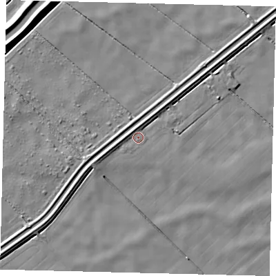 Shaded relief map of the ground around PE113JL, computed from Environment Agency LiDAR. The ground here sits at about 2 m above sea level and falls 7 m across the surrounding 800 m. Surface water reaching this point runs off ground lying to the west, 2.4 m higher.