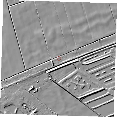 Shaded relief map of the ground around PE134XF, computed from Environment Agency LiDAR. The ground here sits at about 2 m above sea level and falls 7 m across the surrounding 800 m. Surface water reaching this point runs off ground lying to the south-west, 3.2 m higher.