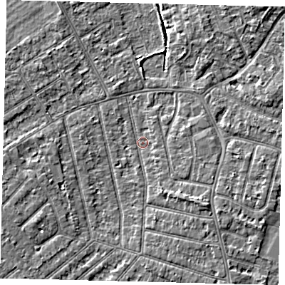 Shaded relief map of the ground around PE13PP, computed from Environment Agency LiDAR. The ground here sits at about 12 m above sea level and falls 5 m across the surrounding 800 m. Surface water reaching this point runs off ground lying to the south-east, 2.7 m higher.